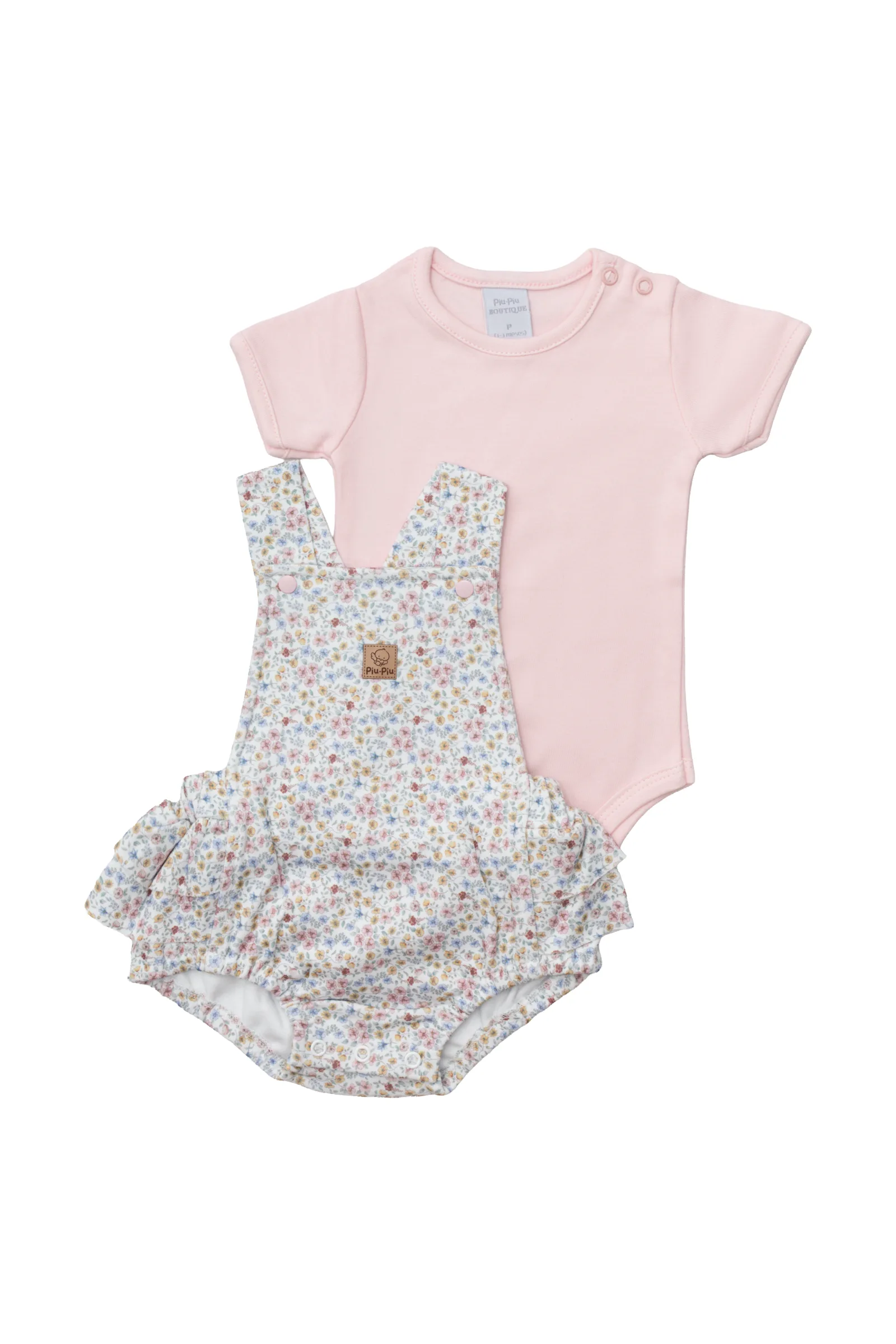 Conjunto body rosa e jardineira com estampa floral